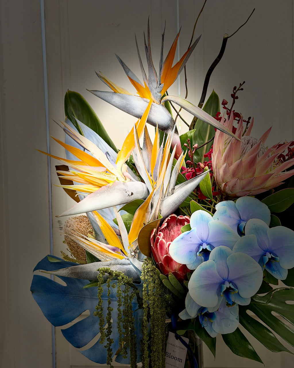 Tropical Statement – Orchid & Protea Arrangement